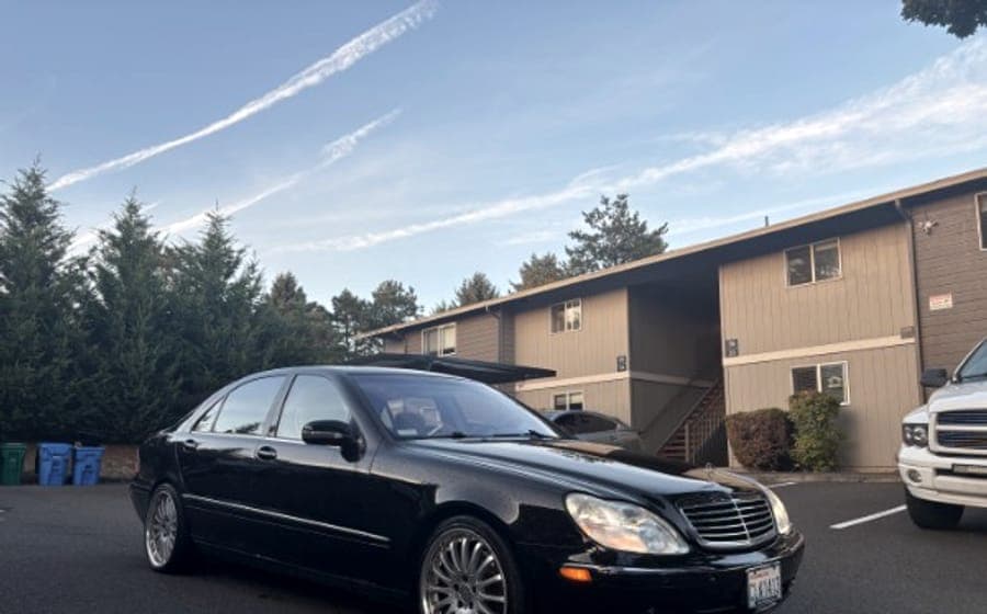 The same Mercedes S-Class, clean and parked after the wash